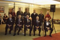 Five WWII veterans and six reenactors